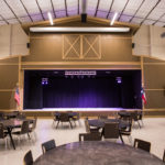 stage in hartman hall purple lights